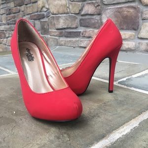 Cherry red pumps